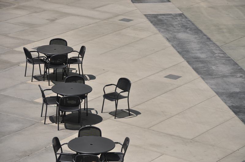 Row of empty chairs in a minimalistic setting