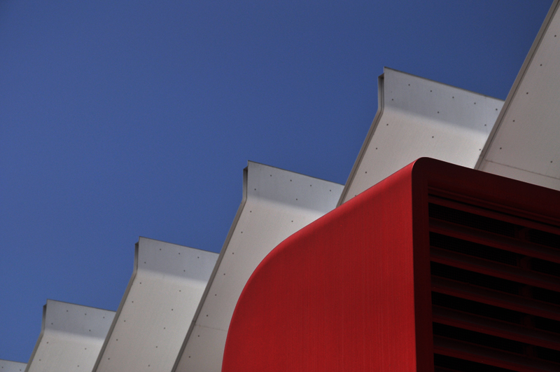 Roof vent against a cloudy sky
